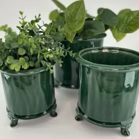 Mörkgrön glaserad kruka på fyra tassar från Miljögården