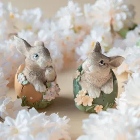 Bunnies in eggs from A Lot Decoration in green and orange surrounded by flowers