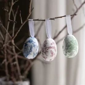 Hanging Easter eggs on a branch in blue, pink and green from A Lot Decoration