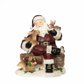 xmas-decoration Santa Claus sitting on a stump surrounded by forest animals from A Lot Decoration
