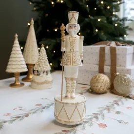 nötknäppare-med-speldosa-jingle-bells-antikcreme-och guld-från-chic-antique