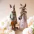 Finely dressed rabbit Mr. and Mrs. surrounded by flowers from A Lot Decoration