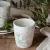 mugg-feelgood-you-are-amazing-vit-med-rosa-blommor-och-gröna-blad-från-majas-cottage