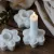 tass-token-lyckofigur-vit-majas-cottage