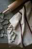The linen-blend kitchen towel from Ernst, shown here being used for Christmas baking.