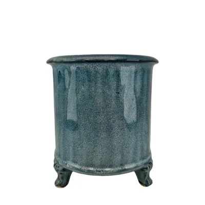 Blå glaserad kruka på fyra tassar i small från Miljögården