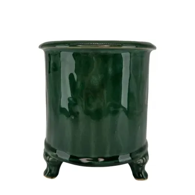 Mörkgrön glaserad kruka på fyra tassar i medium från Miljögården