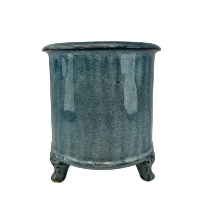 Blå glaserad kruka på fyra tassar i medium från Miljögården