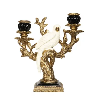 tvåarmad-ljusstake-papegoja-mässing-svart-vit