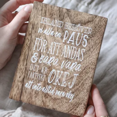 wooden-picture-with-white-text