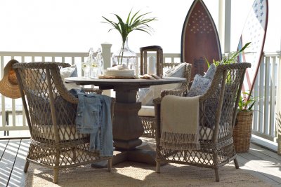 Dining chair Estelle on a patio at a table - Artwood