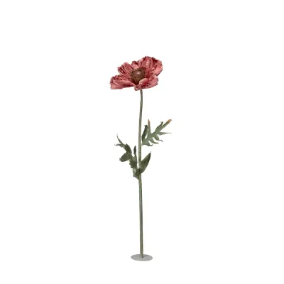 A giant pink paper poppy flower on a long stem with a round metal base, height 140 cm, from Wikholm Form.