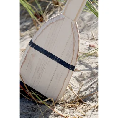 Close-up of decorative oar from Chic Antique showing the blade and patinated finish in antique white and sea blue.