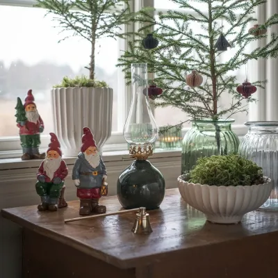 golden-candle-snuffer-on-a-table