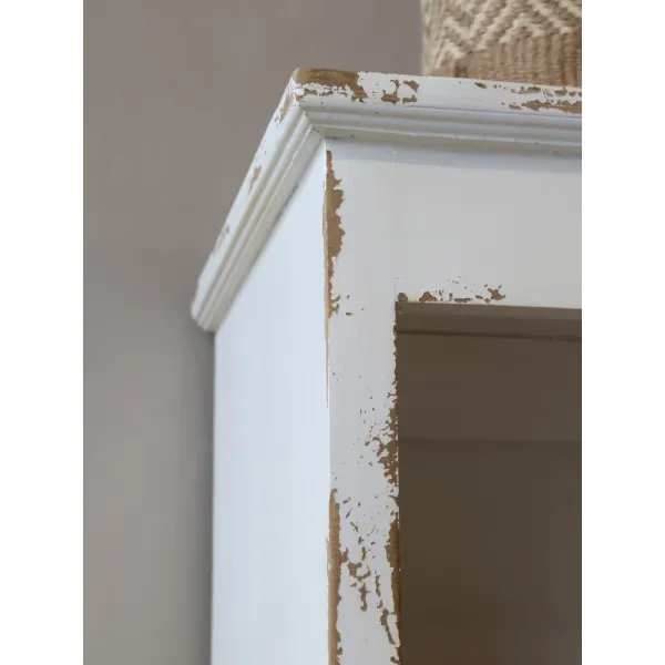 Close-up of the top of the Jacqueline bookcase in antique cream from Chic Antique.