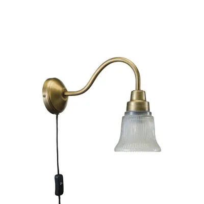 wall-lamp-in-antique-brass-with-clock-shaped-glass-shade