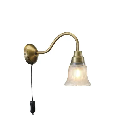 wall-lamp-in-antique-brass-with-clock-shaped-glass-shade