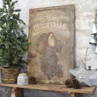 rusty-iron-santa-claus-sign