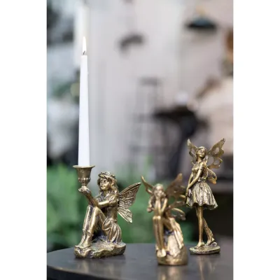 ljusstake-älva-mässing