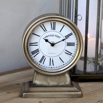 table-clock-on-foot-antique-brass
