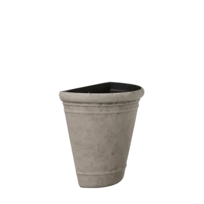 Majvor wall pot in light gray photographed from the side from Wikholm Form.