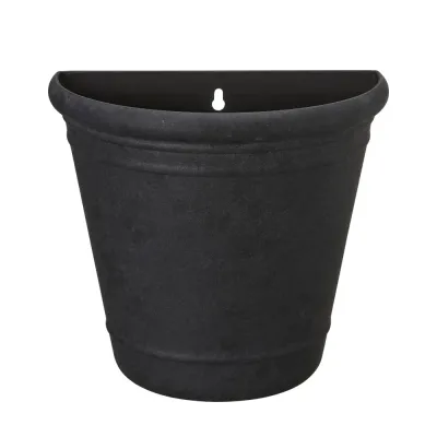 Black semi-circular wall pot Majvor in plastic with a natural dark stone effect and hanging holes from Wikholm Form.