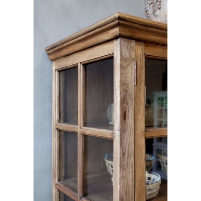 Detail of the cornice on the natural-colored Marseille display cabinet with eight doors.